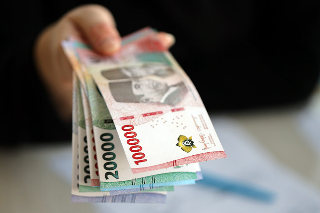 Female accountant hand Indonesian Rupiah Money Indonesian Rupiah Money